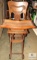 Antique Highchair with Rattan Seat and Metal Wheels