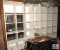 Three Sections of Build-It-Yourself Style Shelf Units with Great Books Collection