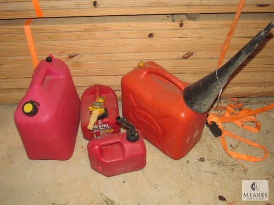 Four Plastic Fuel Cans