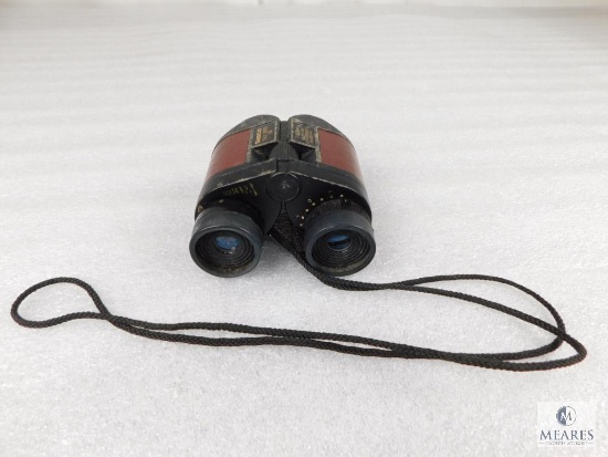 Tasco Binoculars 7-15x25mm