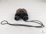 Tasco Binoculars 7-15x25mm