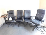 Four Rolling Office Chairs