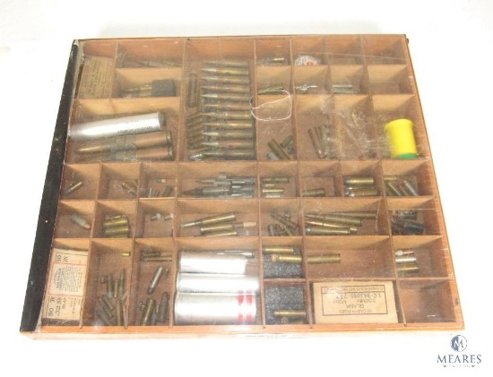 Display Case Full of Unusual, Vintage and Modern Day Caliber Ammo