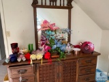 Lot of Home Decorations on Dresser