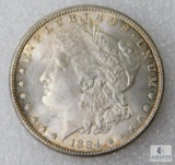 1884 Morgan Dollar, MS64