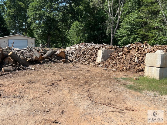 Large Load of Mixed Firewood and Cut Wood Pieces