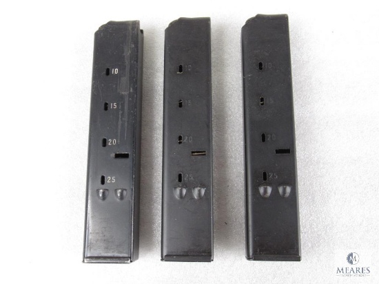 Three UZI 9mm Magazines.