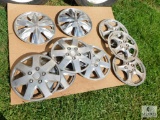 Group of Nine Hubcaps