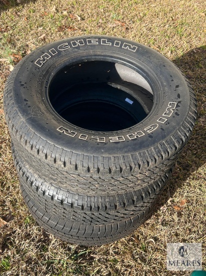 Three Michelin P235/70R16 Road Tires
