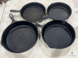 Four Mixed Cast Iron Skillets