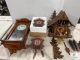 Statue of Liberty Wall Clock and Three Cuckoo Clocks