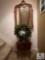 Red Decorative Planter and Gold Trim Mirror