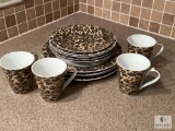 Four Place-setting of Animal Print Plates