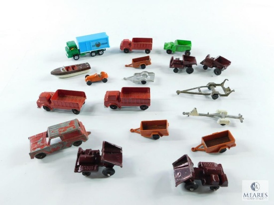Approximately 14 Toy Trucks and Trailers