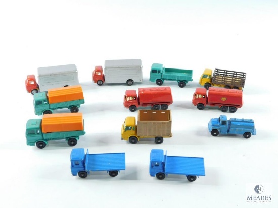 Approximately 12 Toy Trucks and Trailers