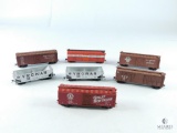 Seven Miniature Train Cars