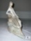 Nao by Lladro Girl Shepard Sitting On Rocks Figurine