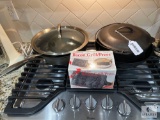 Lodge 12-inch Cast Iron Skillet, Cast Iron #8 Pot with Lid and Metal Cookware - Cooktop is NOT