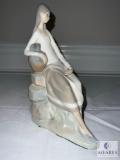 Nao by Lladro Girl Shepard Sitting On Rocks Figurine