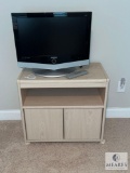 Samsung TV with Two Door Rolling Cart