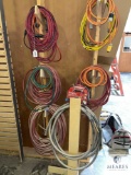 Group of Power Cords and Air Hoses