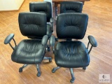 Four Rolling Office Chairs