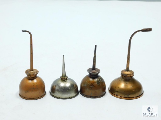 Four Vintage Oil Cans