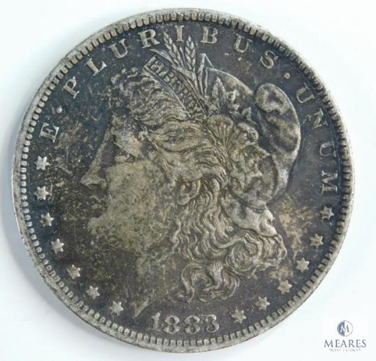 1883-O Morgan Silver Dollar - Toned