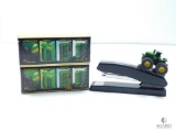 Lot with Two ERTL John Deere 1988 Historical 4 PC Toy Set, Stapler with JD Tractor on Top
