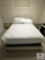 Full-Size Upholstered Bed with Headboard, Box Spring, and Mattress (Located in the Basement)