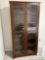 Wooden Glass-Front Display Cabinet with Shelving (Located in the Basement)