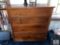 Rustic Wooden Dresser with Lava Lamp and Small Display Shelf