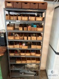 Industrial Metal Shelving Unit with Assorted Parts and Car Jack