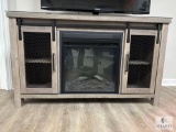 Rustic Fireplace Media Console with Mesh Cabinet Doors (Located in the Basement)