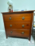 Classic 3-Drawer Wooden Chest with Sony Dream Machine and Decor (Located in the Basement)