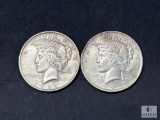 Two 1922 Peace Dollars - One with Bent Rim