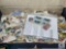 Large Assortment of U.S. and International Stamps - Sheets, Covers, and Loose Collectibles