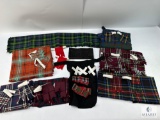 Collection of Traditional Scottish Kilts, Tartan Fabrics, and Accessories
