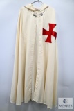 White Ceremonial Cloak with Red Cross Emblem and Ornate Silver Clasp