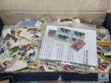 Large Assortment of U.S. and International Stamps - Sheets, Covers, and Loose Collectibles