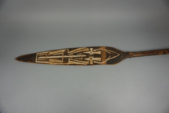 TRIBAL PADDLE WITH CARVING