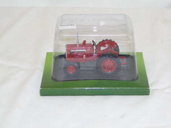 EARLY MODEL DIECAST TRACTORS ON BASE