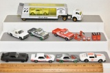 SCALE: 1:64 HAULER AND CARS 1- M2 MACHINES MOON EQUIP CO HAULER AND CAR, 1- MOTORCRAFT CAR/TRUCK