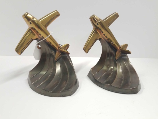 Pair of airplane themed bookends that are in excellent condition period heavy and well-made!