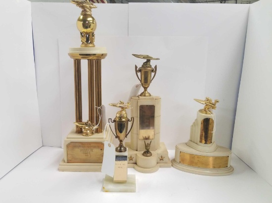 Group of four vintage trophies that are all in great condition and boat themed. Includes Minneapolis