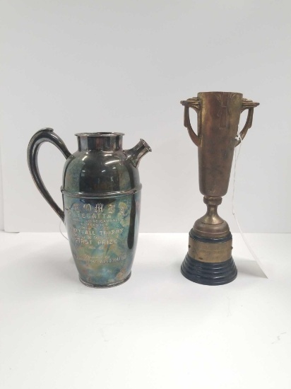 Pair of vintage trophies that both look to be in good condition. One is marked 1929 Regatta first