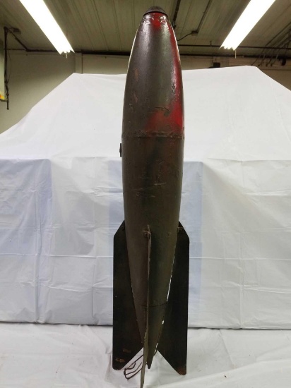 Military Ordnance that would look great in any man cave or game room. Approximately 36 in long.