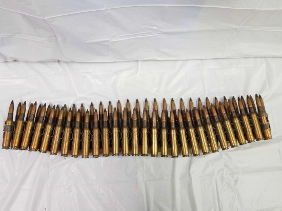 56 rounds of 50 caliber ammunition on clips. See photos for details.