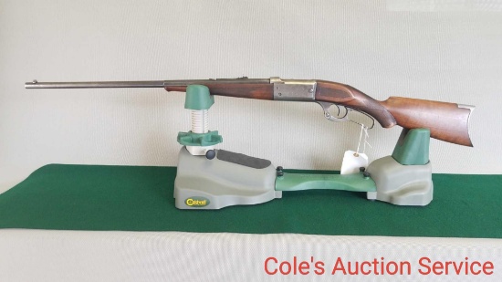 Savage Model 1899CD Deluxe rifle in excellent condition. Features engraved receiver, dated 1906, 26