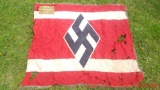 German Nazi flag that measures 4.4 x 3.10. Quite a bit of moth damage. Note, we do not condone the